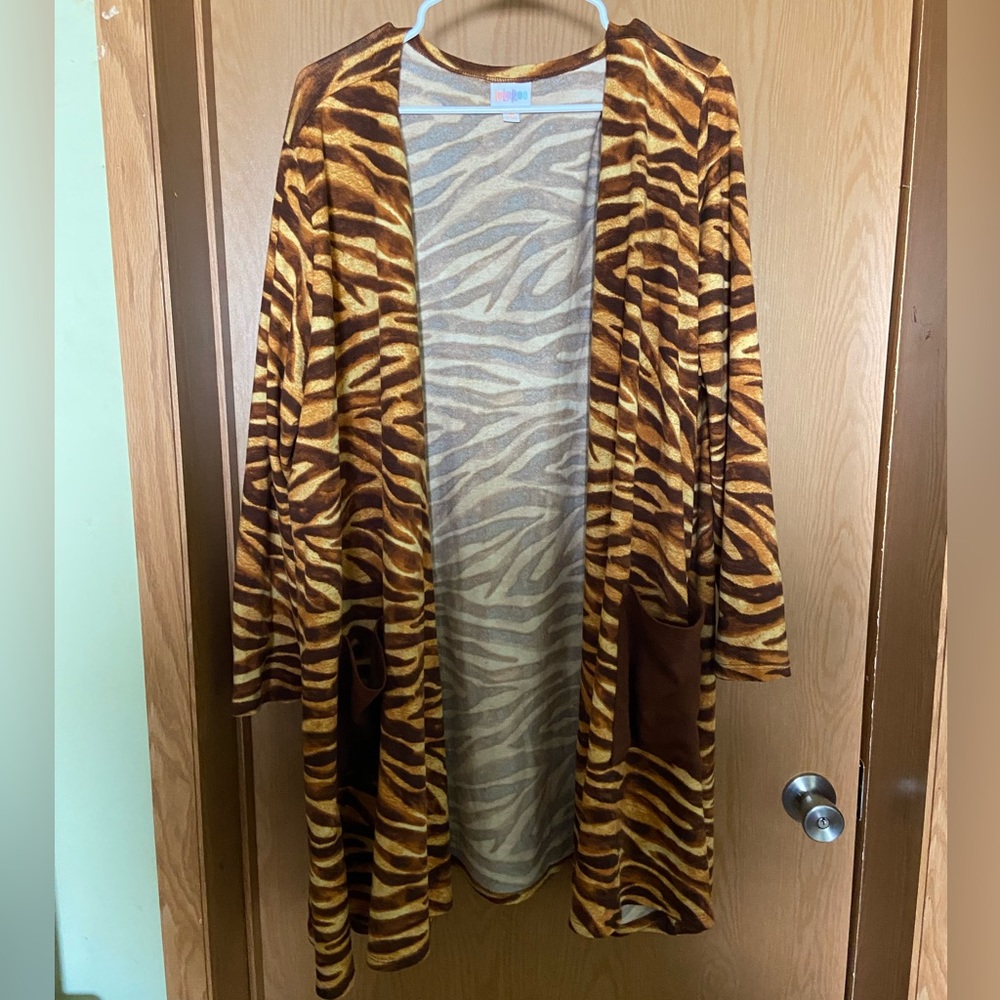 LuLaRoe Caroline Cardigan animal print. Tan and Brown. 3XL. 26-28
